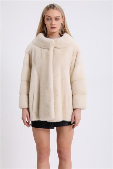 Veste en vison blanc nacré