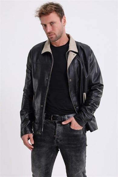 Veste en cuir noire avec détails crème
